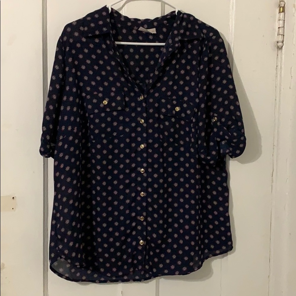 Navy blue blouse w/white pinwheel design.
